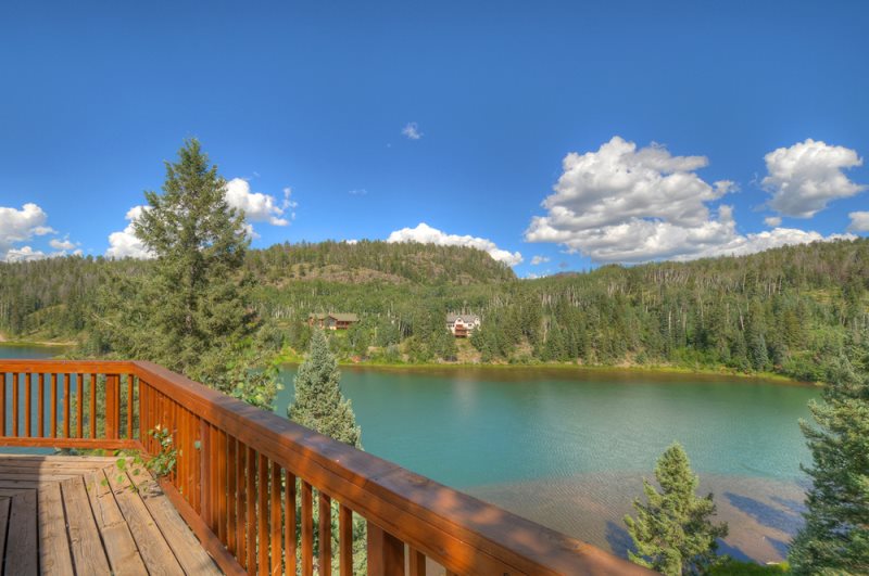 Durango vacation rental mountain home cabin house w wrap around deck overlooking lake and ...