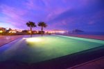 Playa del Paraiso Resort San Felipe night view of swimming pool city lights