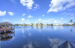 Palm Pointe - Waterfront Vacation Rental Cape Coral with Spa and Fireplace  *currently no pool cage present*