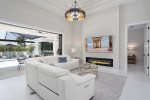 Living Room with Vanishing Sliding Glass Doors bringing in the Outdoor/Indoor Living 