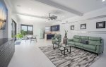 Upstairs Game Room with Bar, TV , Fridge and Balcony Access