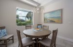 Dining Room with Pool and Garden View