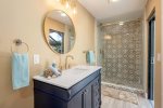 2nd Suite Bathroom with Walk in Shower and Pool Access