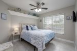 Queen Bedroom with Garden View and TV