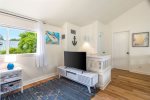 TV and storage in the upstairs loft