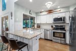 Upgraded Kitchen with new cabinets, countertops, and stainless steel appliances