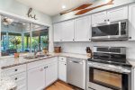Upgraded Kitchen with new cabinets, countertops, and stainless steel appliances