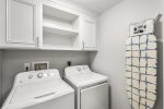 Full size washer and dryer in the unit right off the kitchen