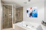 Master bathroom with garden tub and walk in shower