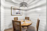 Dining area with shiplap accent walls