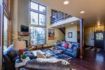 Main living room with large flat screen .