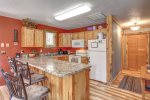 B ig Jim`s Hideaway modern kitchen with hickory cabinets. 
