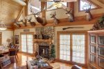 Antler Lodge - Living room/dinning room with gas fireplace. 
