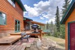 Hillside Hideaway back deck with grill.
