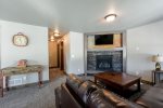 Alta Vista Cabin -Lower family room with gas fireplace and flatscreen TV