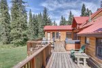 Black Bear Lodge rear deck with hot tub and grill.