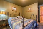 Lower bedroom with queen bed