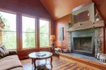 Main floor living area with wood fireplace