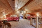 Couloir Cabin loft area with two queen beds.  