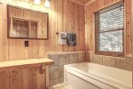 Eagle`s Lair bath with whirlpool tub. 