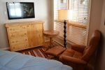 Comfy Leather Chair, Handmade Dresser and Flat Screen TV