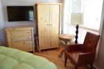 Leather Chair, Handmade Furniture, Hardwood Floors and Navajo Rugs