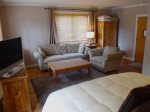 Queen Pullout, Side Chair and Flat Screen TV