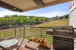 Guests will enjoy mountain views from the furnished outdoor balcony equipped with a gas grill.