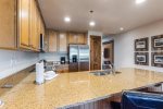 Open kitchen with granite countertops