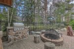 Outdoor common area with firepit at Seasons