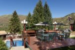 Year-round guests enjoy the outdoor heated pool and the amazing views