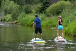 Paddleboarding the Roaring Fork River is a popular summer activity.