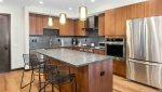 Kitchen island and fridge 