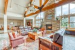 Spacious lobby with great fireplace and mountain views