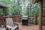 Multiple patios with forested views