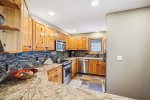 Updated with granite countertops and stainless steel appliances