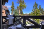 Outdoor patio with gas grill off living room