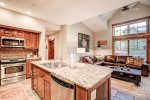 Kitchen with granite countertops and stainless steel appliances