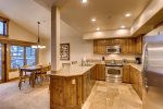 Kitchen with granite countertops and stainless steel appliances