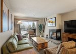 Open living area with views of Aspen Mountain