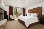 Primary Bedroom with Gas Fireplace and Mountain View