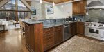 The gourmet kitchen is a culinary artist`s dream, featuring a professional Wolf range