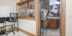 Elevate your leisure time in the private rooftop hot tub, where an outdoor fireplace creates an enchanting ambiance for evening relaxation