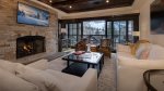 Stone fireplace with views of the slopes