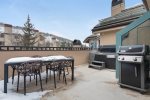 Private Balcony features a gas grill, dining table for 6 and private hot tub.