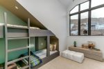 The left side of the room has two twin beds