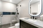 Guest Bedroom 2 Ensuite Bath with Single Vanity and Walk In Shower