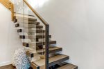 Wood and Glass Staircase to take you to the upper levels