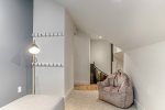 3rd Floor Loft additional seating and landing from spiral staircase
