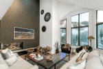 Living Room features a gas fireplace and large flat screen TV that displays a beautiful picture when turned off.
